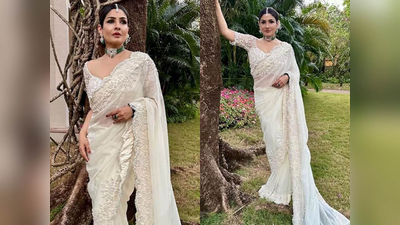 Raveena Tandon is a picture of elegance in white saree for wedding